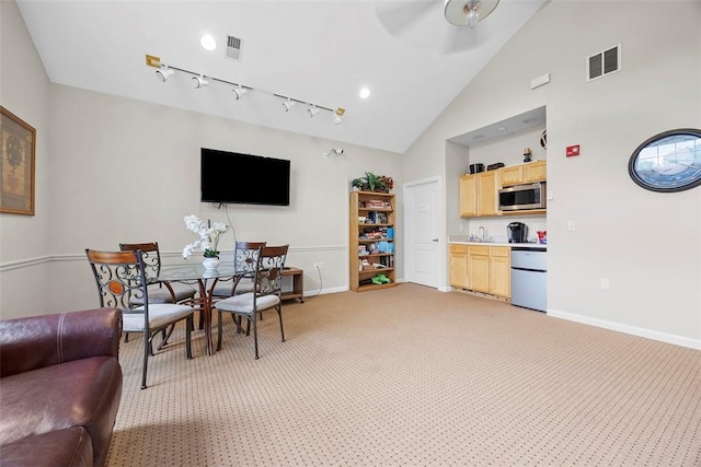 200 Hidden Ridge Ct Unit 202, South Park, PA 15129 - living room featuring baseboards, light carpet, a ceiling fan, high vaulted ceiling, and track lighting