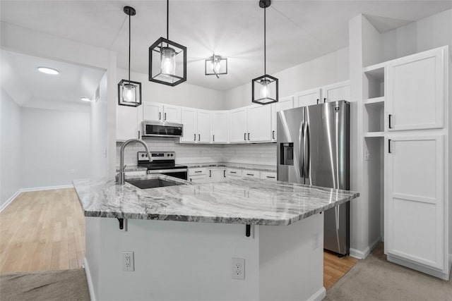 200 Hidden Ridge Ct Unit 202, South Park, PA 15129 - kitchen with stainless steel appliances, open shelves, white cabinets, light stone countertops, and a kitchen breakfast bar