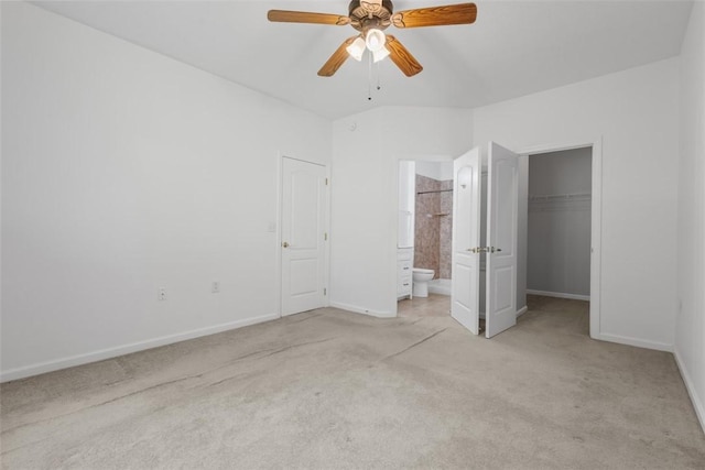 200 Hidden Ridge Ct Unit 202, South Park, PA 15129 - unfurnished bedroom featuring light carpet, a walk in closet, ensuite bathroom, a closet, and ceiling fan