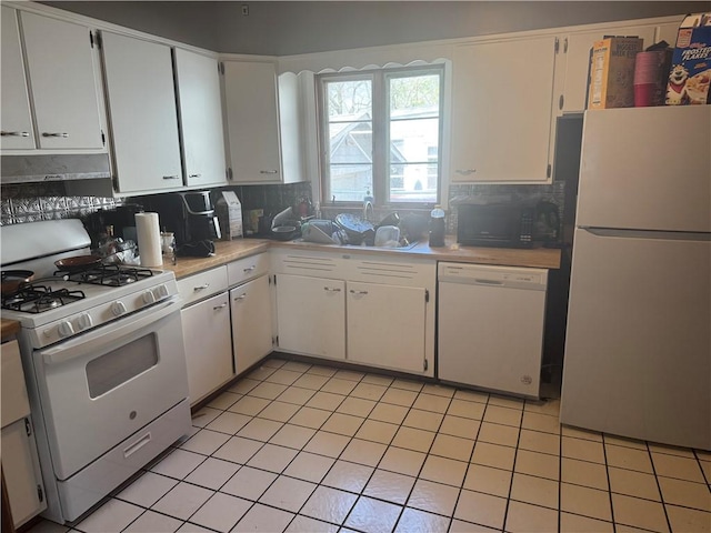257 Euclid Ave, Sharon, PA 16146 - kitchen featuring white appliances, light countertops, decorative backsplash, and white cabinets