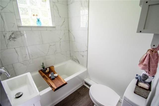 721 Grant Ave, West Mifflin, PA 15122 - full bath featuring toilet, a sink, wood finished floors, and tub / shower combination