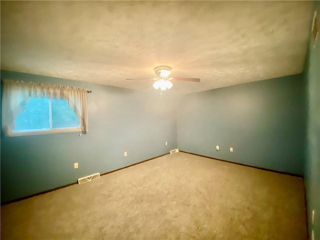 109 Parkside Dr, West Mifflin, PA 15122 - spare room featuring a ceiling fan, carpet floors, and baseboards