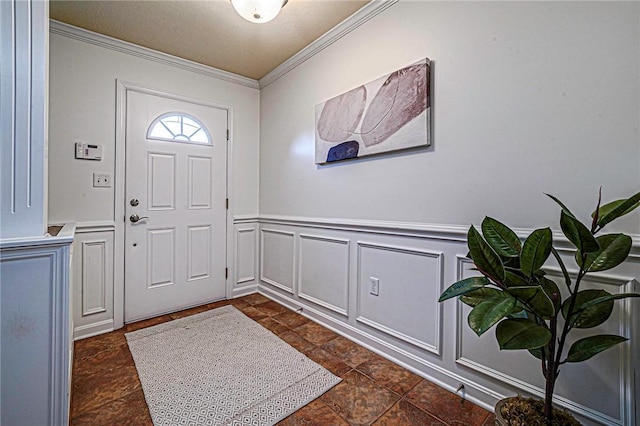 250 Overlook Ct, Robinson Twp Nwa, PA 15108 - entrance foyer featuring ornamental molding, a decorative wall, stone tile flooring, and a wainscoted wall