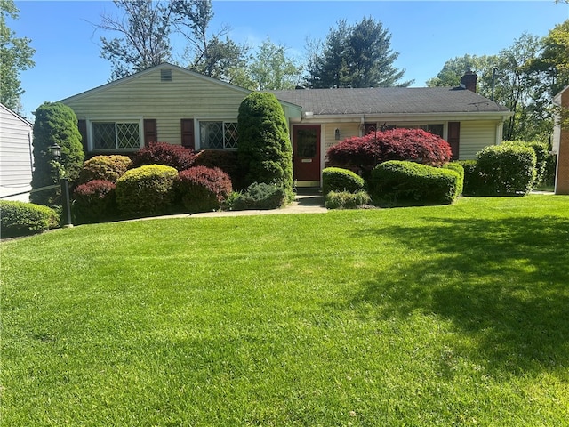 127 Opal Ct, Natrona Hts/Harrison Twp, PA 15065 - view of front of home with a front lawn and a chimney
