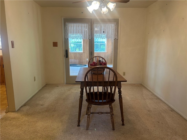 127 Opal Ct, Natrona Hts/Harrison Twp, PA 15065 - dining room with ceiling fan, carpet floors, and baseboards