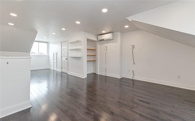 170 Home St, Lawrenceville, PA 15201 - additional living space featuring a wall unit AC, dark wood-style floors, recessed lighting, and baseboards