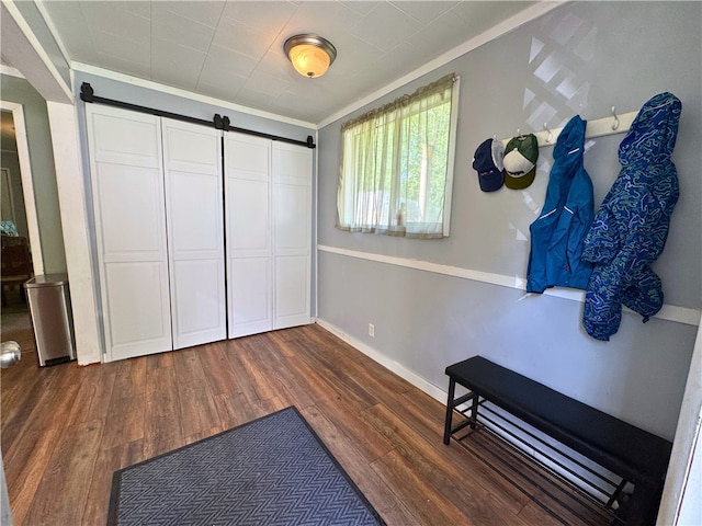 27 Oak Hill Dr, Pine Twp Mer, PA 16127 - unfurnished room with ornamental molding, dark wood finished floors, a barn door, and baseboards
