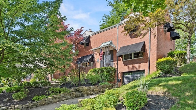 817 Wainwright Dr, Mt Lebanon, PA 15228 - view of front of home with brick siding and an attached garage
