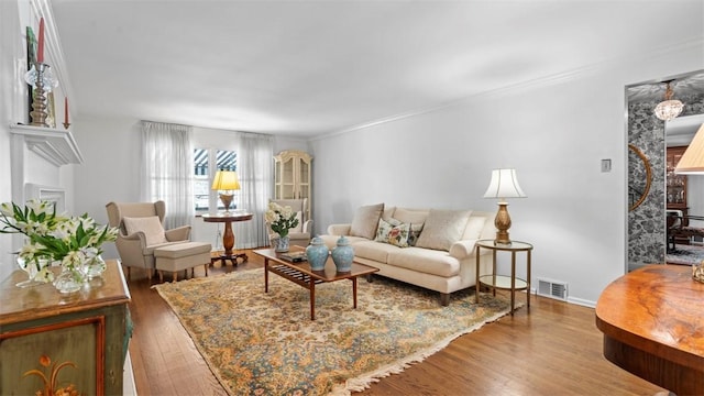 817 Wainwright Dr, Mt Lebanon, PA 15228 - living area featuring wood finished floors and ornamental molding