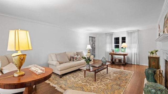 817 Wainwright Dr, Mt Lebanon, PA 15228 - living room featuring a fireplace, wood finished floors, crown molding, and baseboards