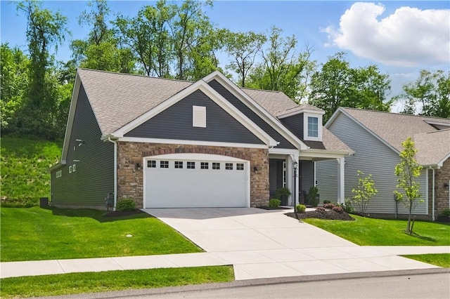 2019 Aiken Ct, Robinson Twp Nwa, PA 15136 - craftsman-style house featuring driveway, a garage, a front yard, and stone siding