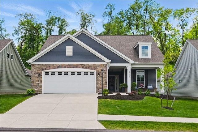 2019 Aiken Ct, Robinson Twp Nwa, PA 15136 - craftsman-style house featuring a garage, driveway, a front lawn, stone siding, and a shingled roof