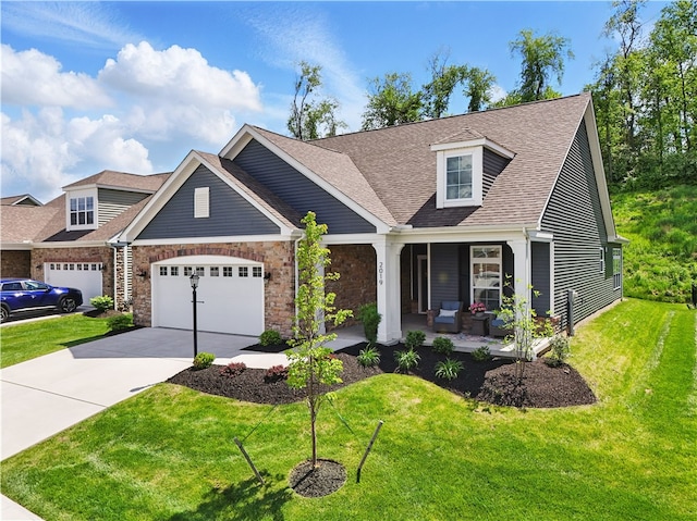 2019 Aiken Ct, Robinson Twp Nwa, PA 15136 - view of front of home with an attached garage, concrete driveway, a porch, a front lawn, and roof with shingles