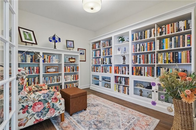 2019 Aiken Ct, Robinson Twp Nwa, PA 15136 - sitting room featuring wall of books and wood finished floors
