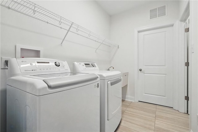 2019 Aiken Ct, Robinson Twp Nwa, PA 15136 - laundry area featuring separate washer and dryer and baseboards