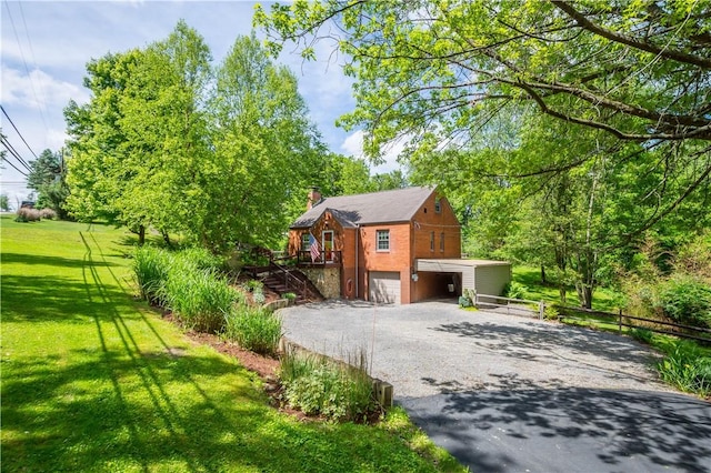 105 Brookwood Rd, Peters Twp, PA 15367 - view of front of property with a garage, driveway, a chimney, and stairs
