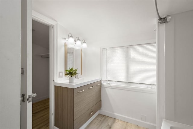 105 Brookwood Rd, Peters Twp, PA 15367 - full bathroom featuring vanity, wood finished floors, and baseboards