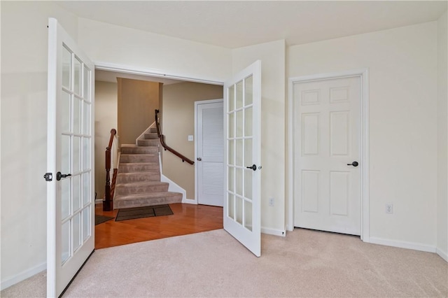 3005 Village Run Rd, Pine Twp Nal, PA 15090 - stairway featuring french doors, carpet floors, and baseboards