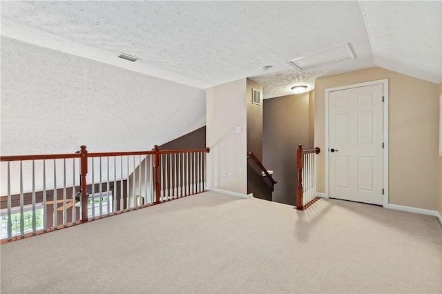 3005 Village Run Rd, Pine Twp Nal, PA 15090 - bonus room featuring lofted ceiling, attic access, a textured ceiling, carpet flooring, and baseboards