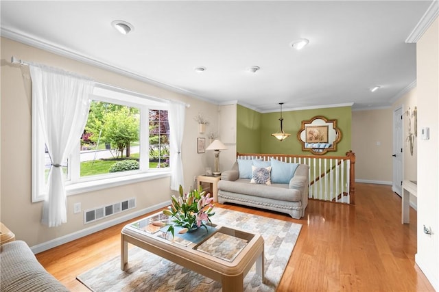 842 Towercrest Dr, Mt Lebanon, PA 15228 - living room with ornamental molding, light wood-type flooring, and baseboards