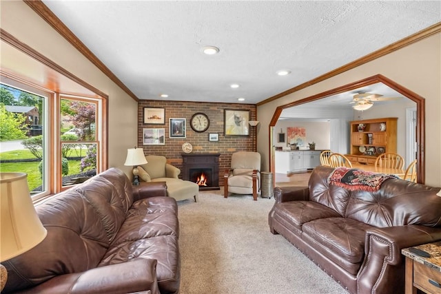 842 Towercrest Dr, Mt Lebanon, PA 15228 - carpeted living area featuring crown molding, a fireplace, recessed lighting, and a textured ceiling