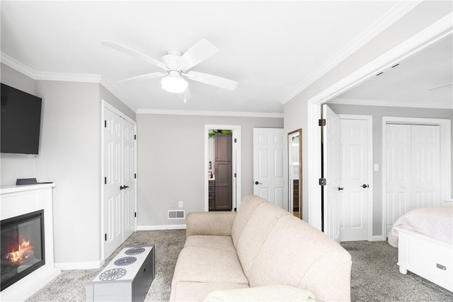 842 Towercrest Dr, Mt Lebanon, PA 15228 - carpeted living room featuring ceiling fan, a glass covered fireplace, baseboards, and crown molding