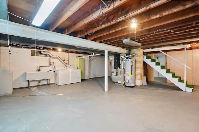 349 State Ave, Beaver, PA 15009 - unfinished below grade area with water heater, washing machine and clothes dryer, stairway, a sink, and heating unit