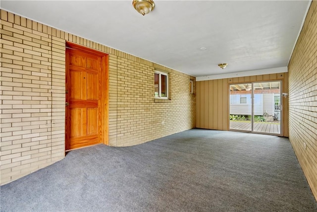 349 State Ave, Beaver, PA 15009 - carpeted spare room with brick wall