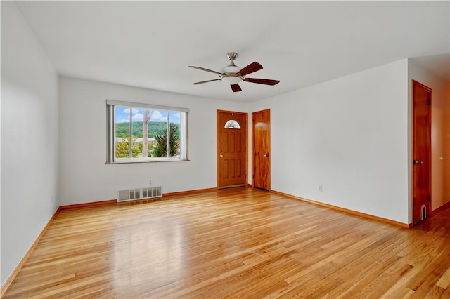 349 State Ave, Beaver, PA 15009 - unfurnished room featuring light wood finished floors, ceiling fan, and baseboards