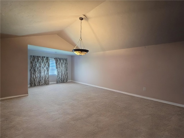 2201 Hunt Club Dr, Hempfield Twp Wml, PA 15601 - carpeted empty room featuring lofted ceiling and baseboards