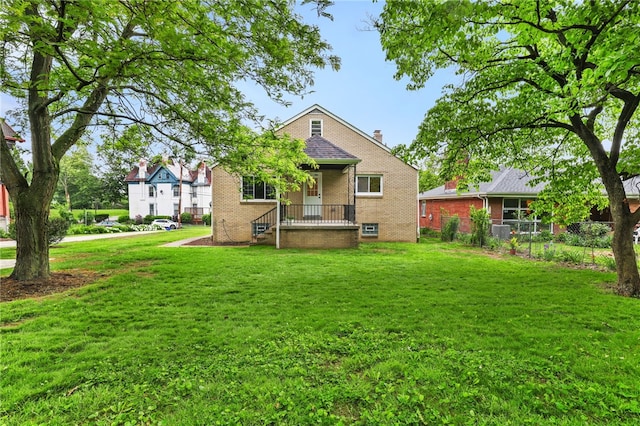 7118 Mcpherson Blvd, Point Breeze, PA 15208 - back of house with brick siding and a chimney