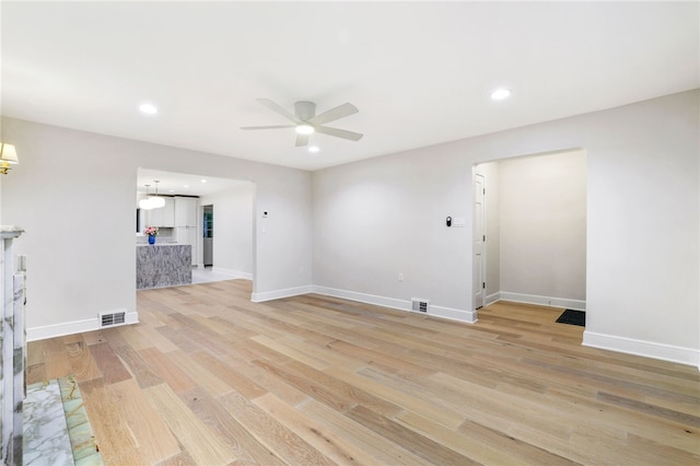 7118 Mcpherson Blvd, Point Breeze, PA 15208 - unfurnished living room featuring a ceiling fan, light wood finished floors, baseboards, and recessed lighting