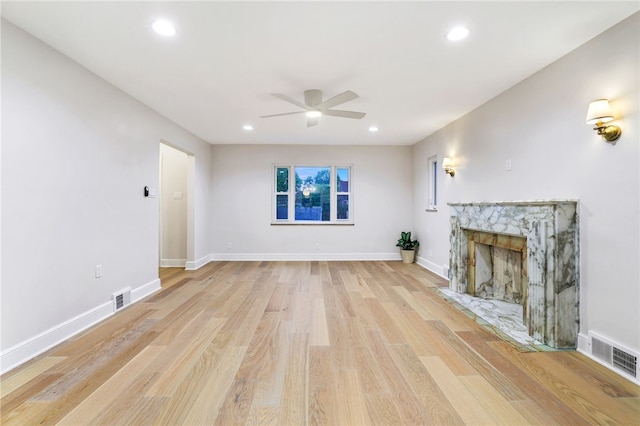 7118 Mcpherson Blvd, Point Breeze, PA 15208 - unfurnished living room featuring ceiling fan, recessed lighting, light wood-type flooring, baseboards, and a high end fireplace