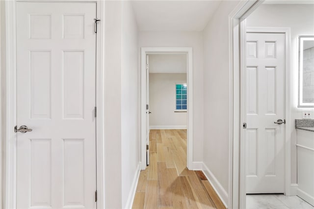 7118 Mcpherson Blvd, Point Breeze, PA 15208 - hallway with light wood finished floors and baseboards
