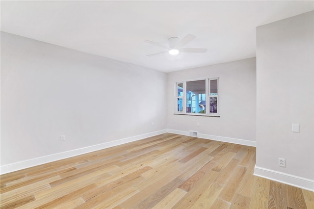 7118 Mcpherson Blvd, Point Breeze, PA 15208 - unfurnished room with a ceiling fan, light wood-type flooring, and baseboards
