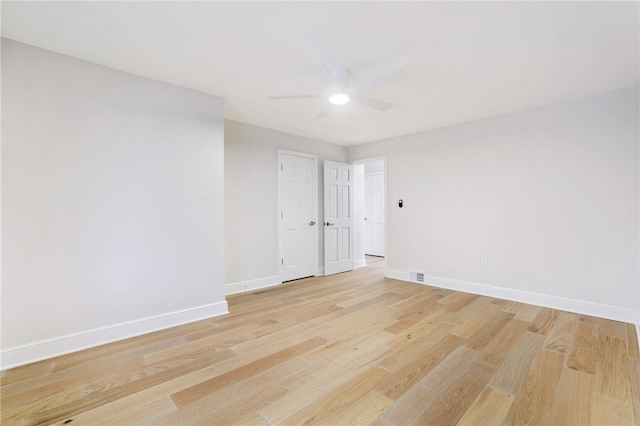 7118 Mcpherson Blvd, Point Breeze, PA 15208 - spare room featuring a ceiling fan, baseboards, and light wood-style floors