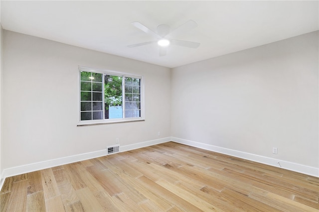7118 Mcpherson Blvd, Point Breeze, PA 15208 - unfurnished room with light wood finished floors, baseboards, and a ceiling fan