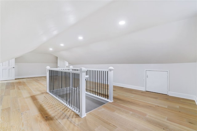 7118 Mcpherson Blvd, Point Breeze, PA 15208 - bonus room with lofted ceiling, wood finished floors, baseboards, and recessed lighting