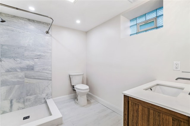 7118 Mcpherson Blvd, Point Breeze, PA 15208 - full bathroom with toilet, baseboards, a shower stall, vanity, and recessed lighting