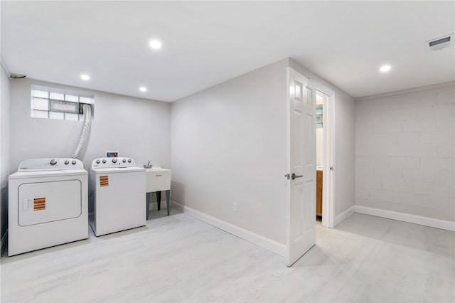 7118 Mcpherson Blvd, Point Breeze, PA 15208 - washroom with washing machine and dryer, baseboards, and recessed lighting