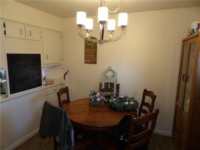 192 Searight Ave, Uniontown, PA 15401 - dining room featuring a chandelier and baseboards