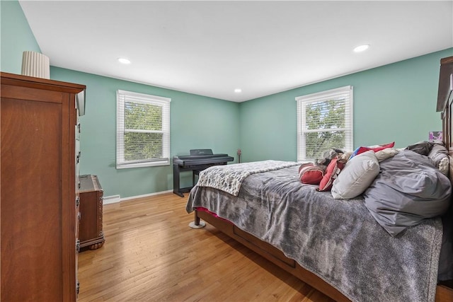 1209 Satellite Cir, Upper St Clair, PA 15241 - bedroom with wood finished floors, multiple windows, recessed lighting, and baseboards