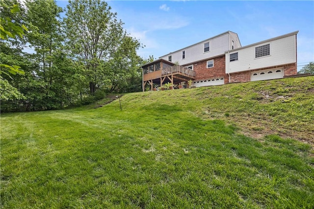 1209 Satellite Cir, Upper St Clair, PA 15241 - back of property featuring a garage, a deck, a yard, and brick siding