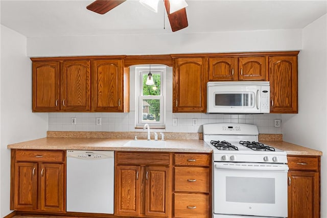 51 Hollow Haven Dr, Baldwin Boro, PA 15236 - kitchen with white appliances, a sink, tasteful backsplash, and a ceiling fan