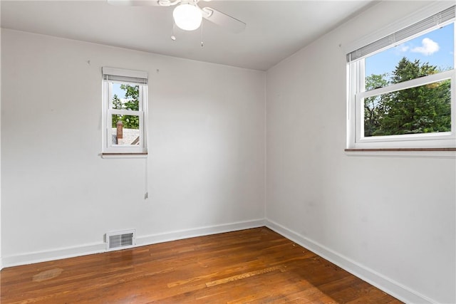 51 Hollow Haven Dr, Baldwin Boro, PA 15236 - spare room featuring plenty of natural light, wood-type flooring, a ceiling fan, and baseboards