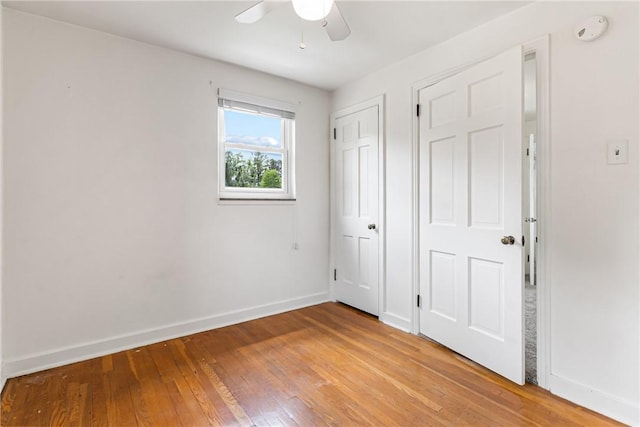 51 Hollow Haven Dr, Baldwin Boro, PA 15236 - unfurnished bedroom featuring light wood-style floors, baseboards, and a ceiling fan
