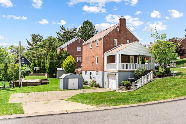 51 Hollow Haven Dr, Baldwin Boro, PA 15236 - view of home's exterior with a lawn, driveway, an attached garage, and a porch