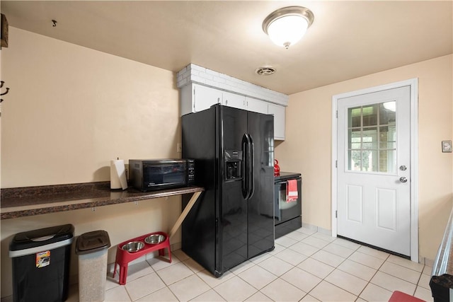 5266 Meadowcrest Rd, Baldwin Boro, PA 15236 - kitchen featuring black appliances, white cabinets, light tile patterned floors, and dark countertops