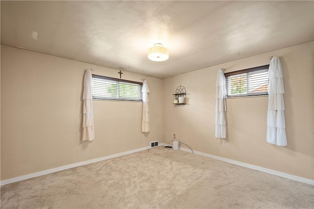 5266 Meadowcrest Rd, Baldwin Boro, PA 15236 - carpeted spare room with healthy amount of natural light and baseboards