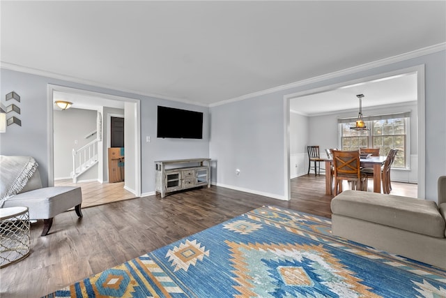 7104 Cresswyck Ct, Marshall, PA 15090 - living room with crown molding, wood finished floors, baseboards, and stairway